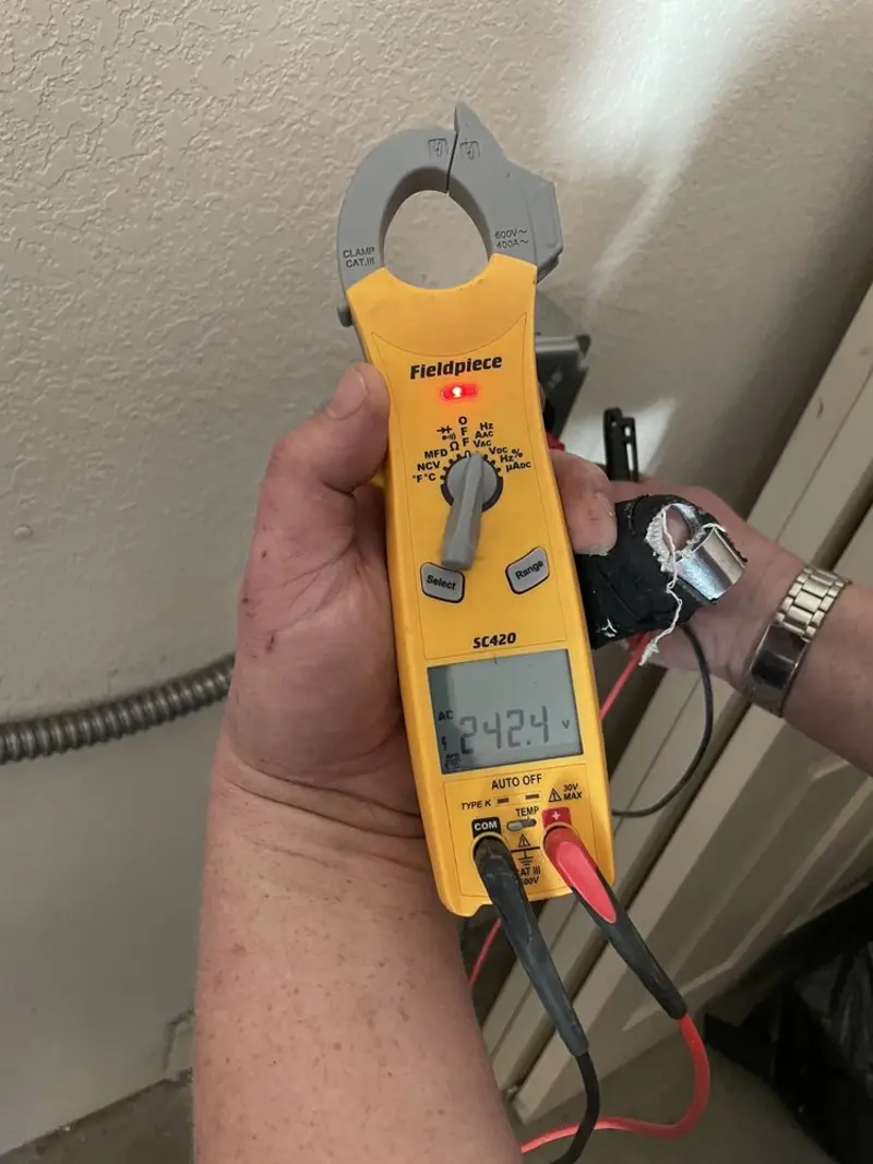 Voltage testing with clamp meter during Hot Tub / Pool Electrical Wiring in Eaton